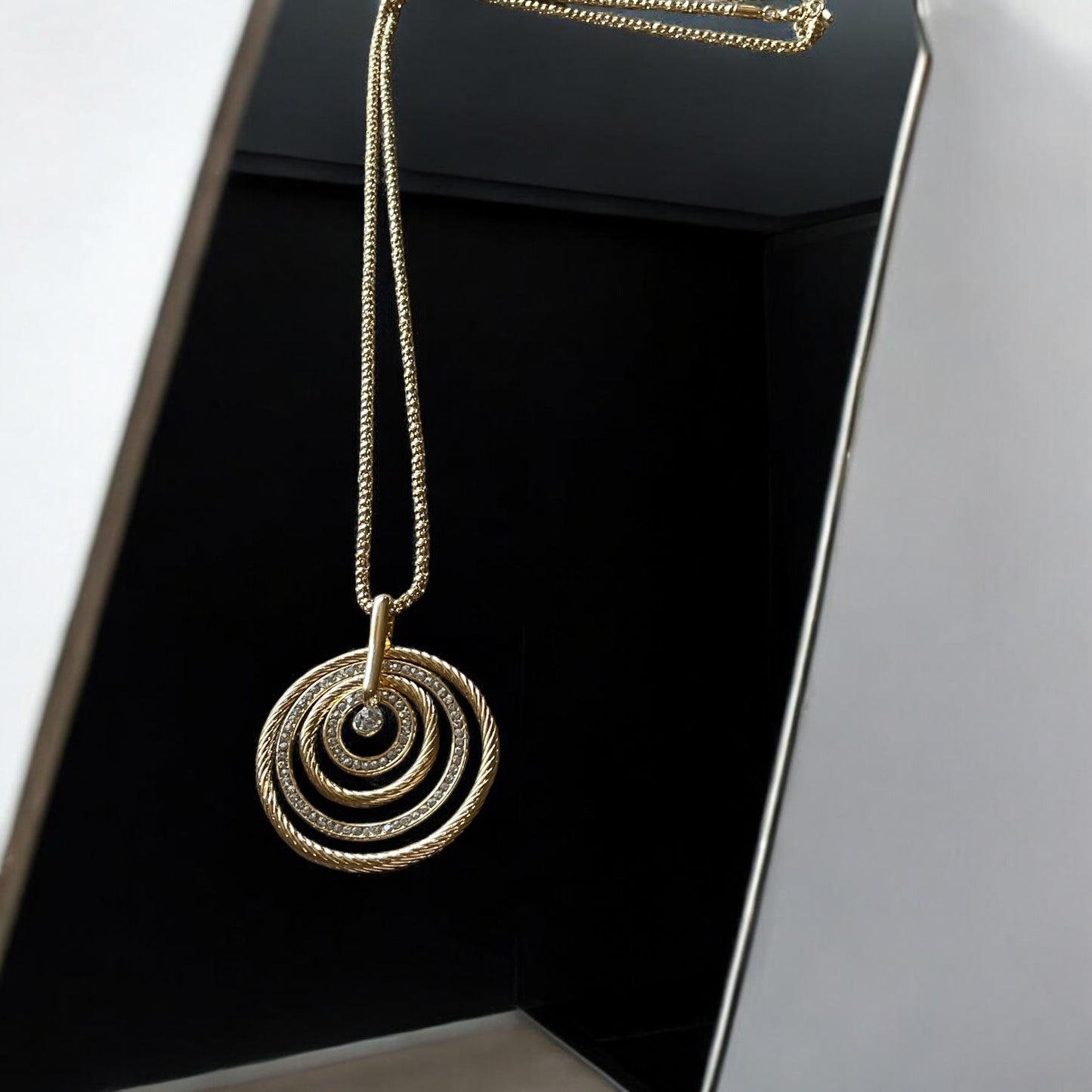 Long Golden Chain with circle and zircon pendant