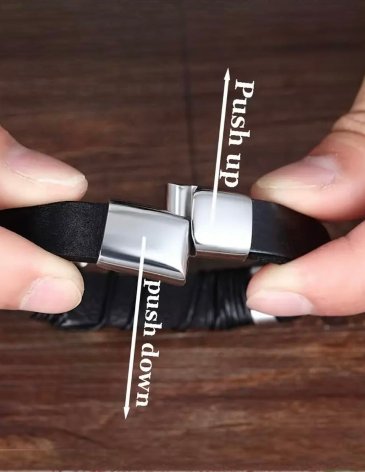 Eternal Bond: The Black Leather & Silver Interlocking Rings Bracelet